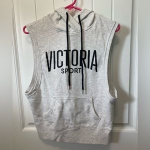 Victoria Sport hooded sweatshirt vest. Open back slot. Size Small.